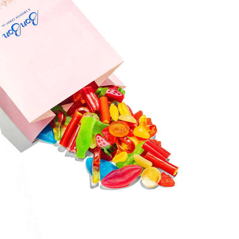 A pink BonBon candy bag spilling Sweet Mix